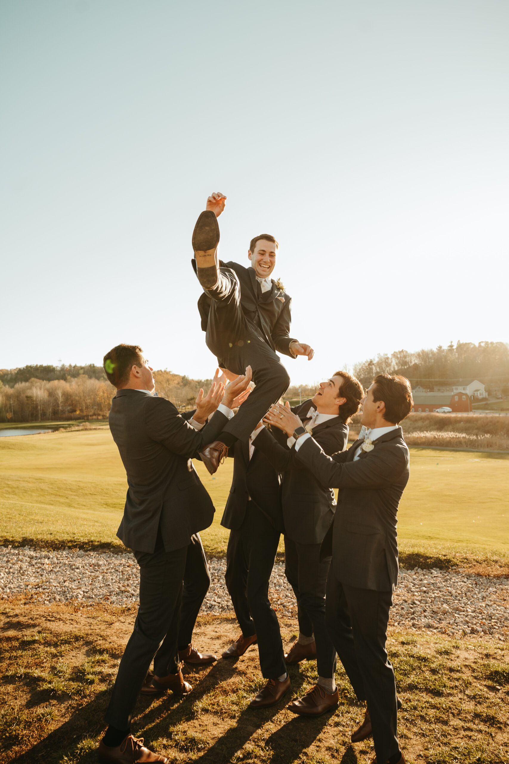 groom and groomsmen at The Red Barn at Outlook Farm
