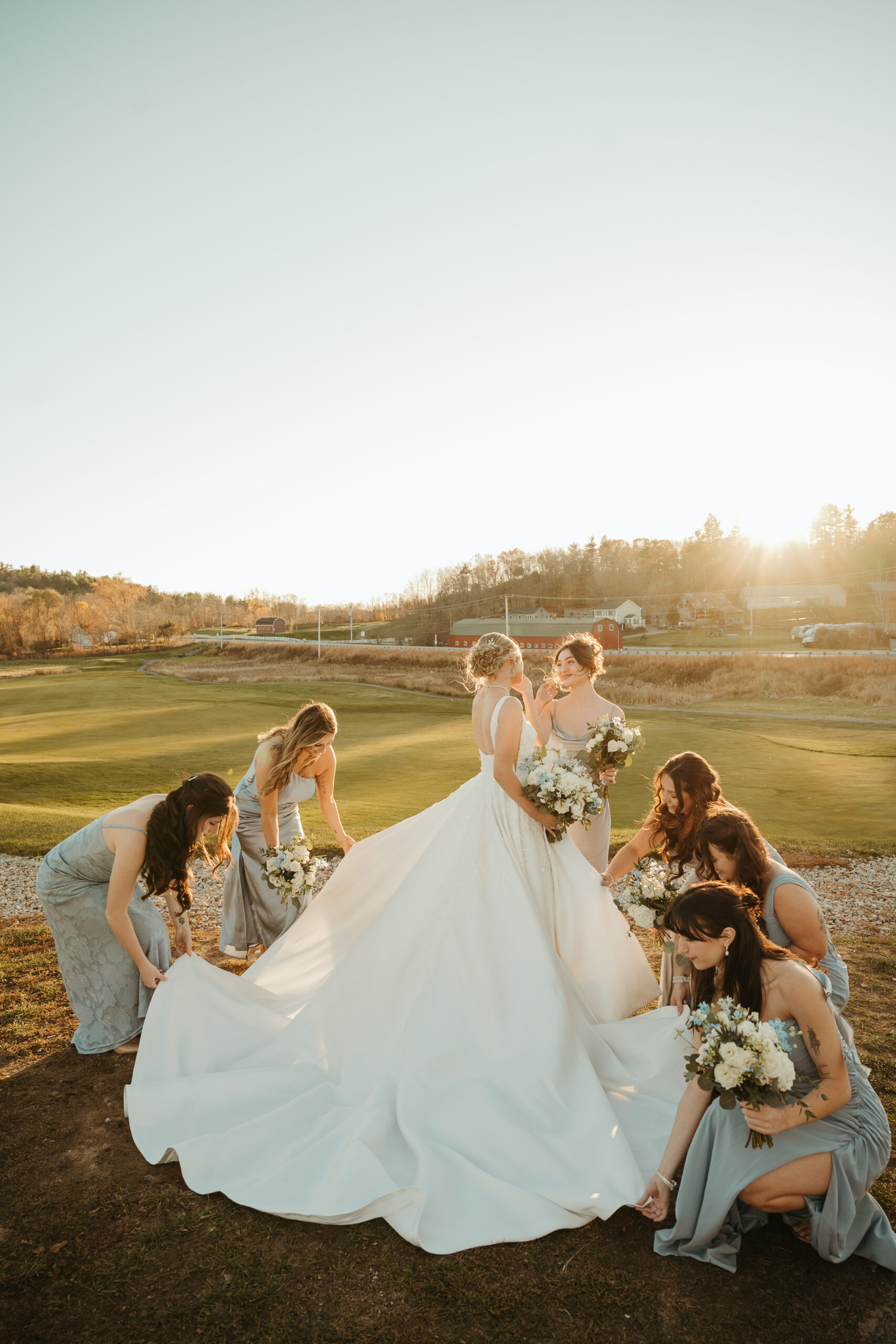 bride and bridesmaid at The Red Barn at Outlook Farm