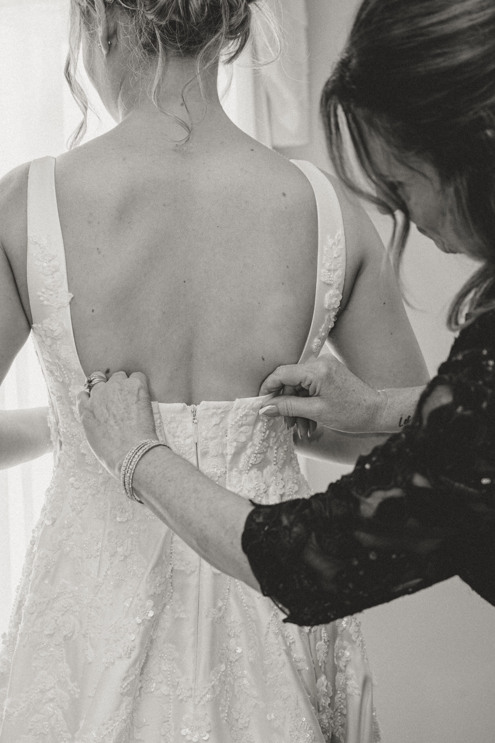 bride getting in wedding dress at Stage House Inn